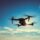 dark-silhouette-quadcopter-drone-hovers